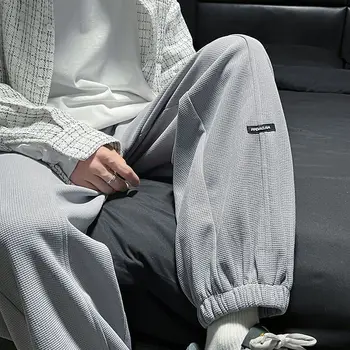 Nyári vékony palacsintát alkalmi nadrág a férfiak laza, sokoldalú trendi leggings hongkongi stílus divat széles láb melegítő nadrág